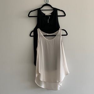 Lush Black and white sleeveless blouse
